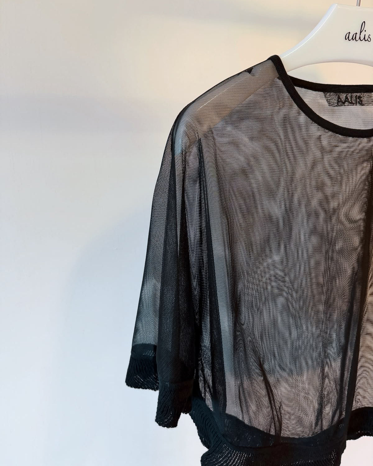 (Pre-order) aalis CARPI mesh cape with knitted ruffle trim (Black)